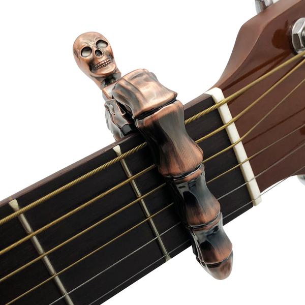 Skull finger guitar capo